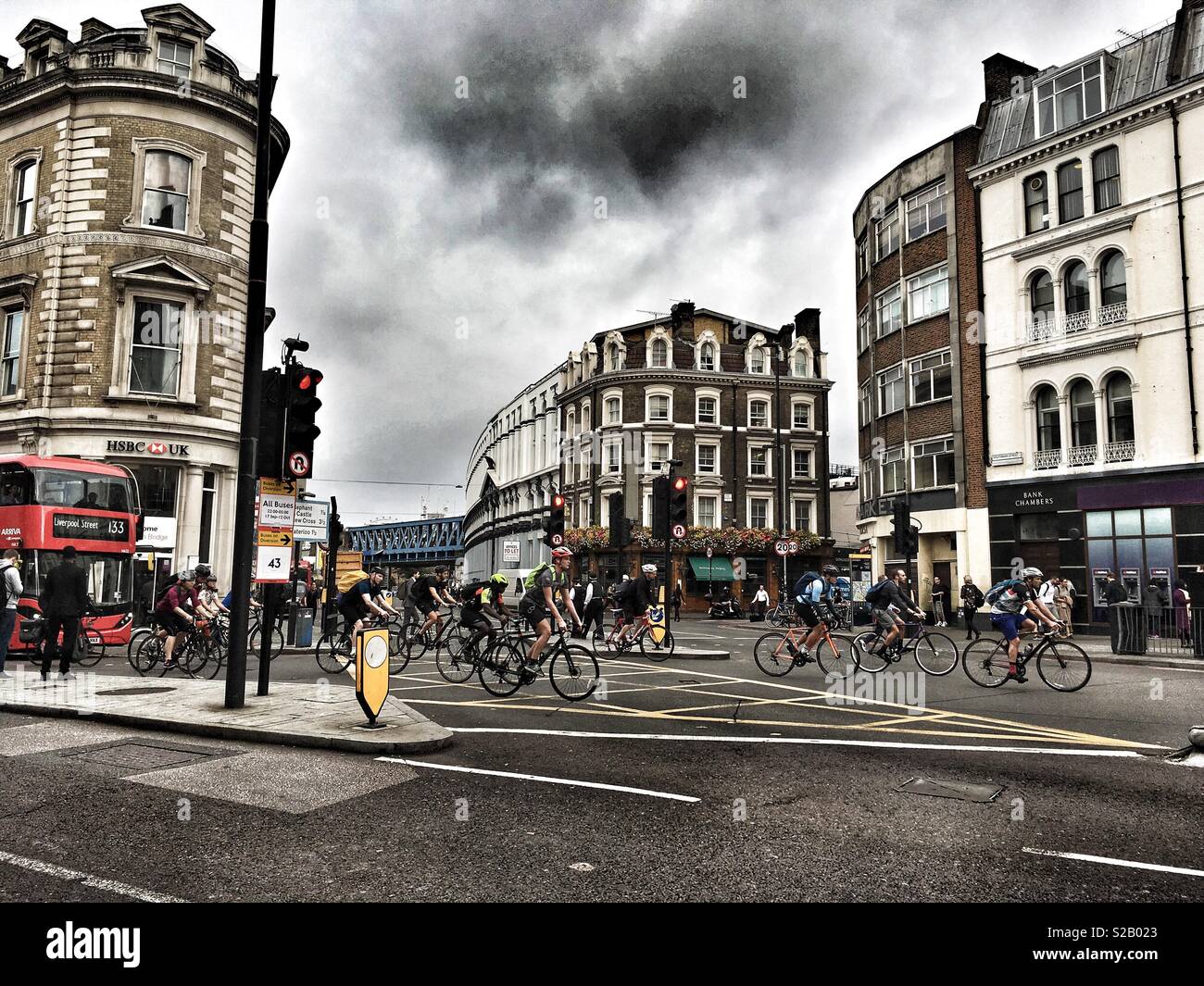 Lots of cyclists on Borough High Street in London, England - Smartphone Captured Stock Image