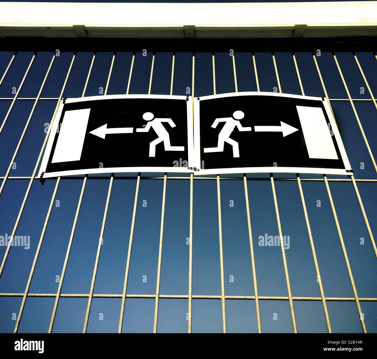 Two exit signs Stock Photo