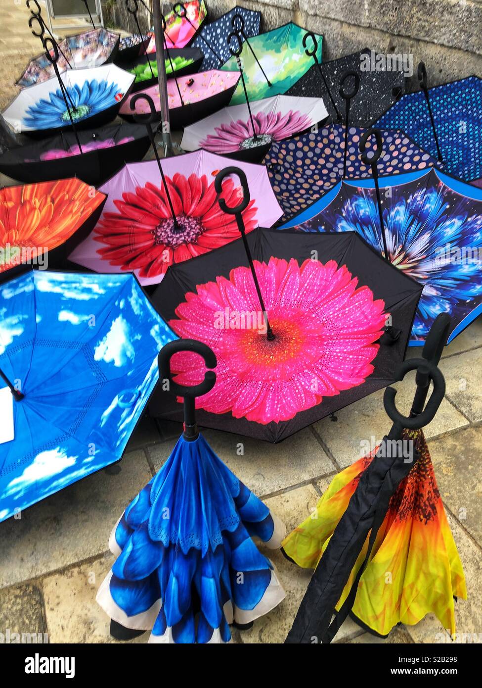 Colourful umbrellas for sale. - Smartphone Captured Stock Image