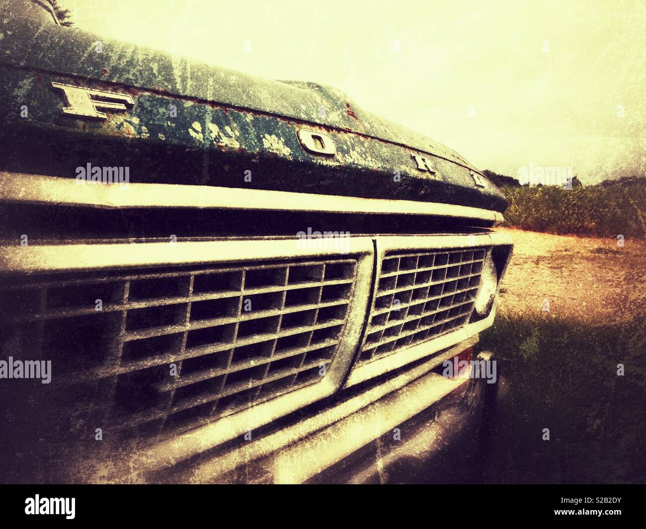 Grunge photo of vintage 1970 Ford Ranger grill in field Stock Photo - Alamy