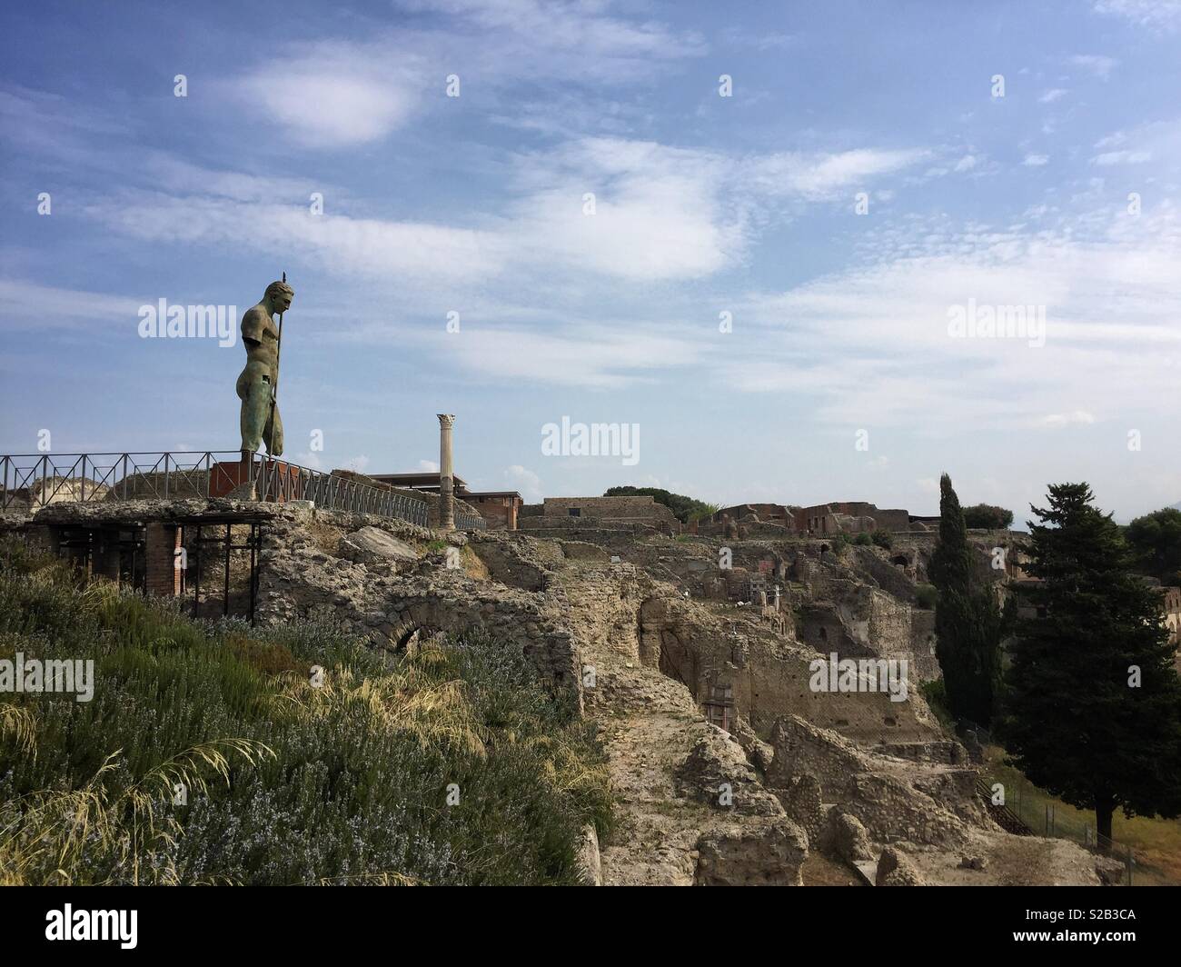 Bronze statue of Apollo on a hillside in the ruins of Pompeii Stock Photo Alamy