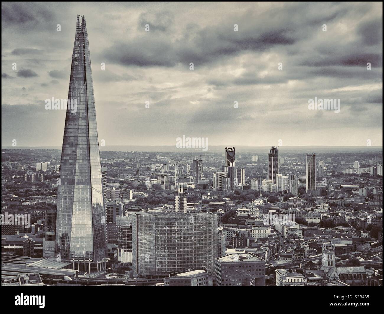 An aerial view of the tallest building in the UK & the EU - The Shard or Shard Of Glass is in Southwark, London. Construction was completed in 2012. It has 96 floors - 72 are habitable. © C.HOSKINS. - Smartphone Captured Stock Image