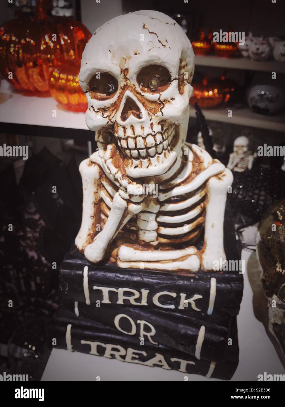 Halloween decoration have a skeleton and trick-or-treat sign, USAA - Smartphone Captured Stock Image