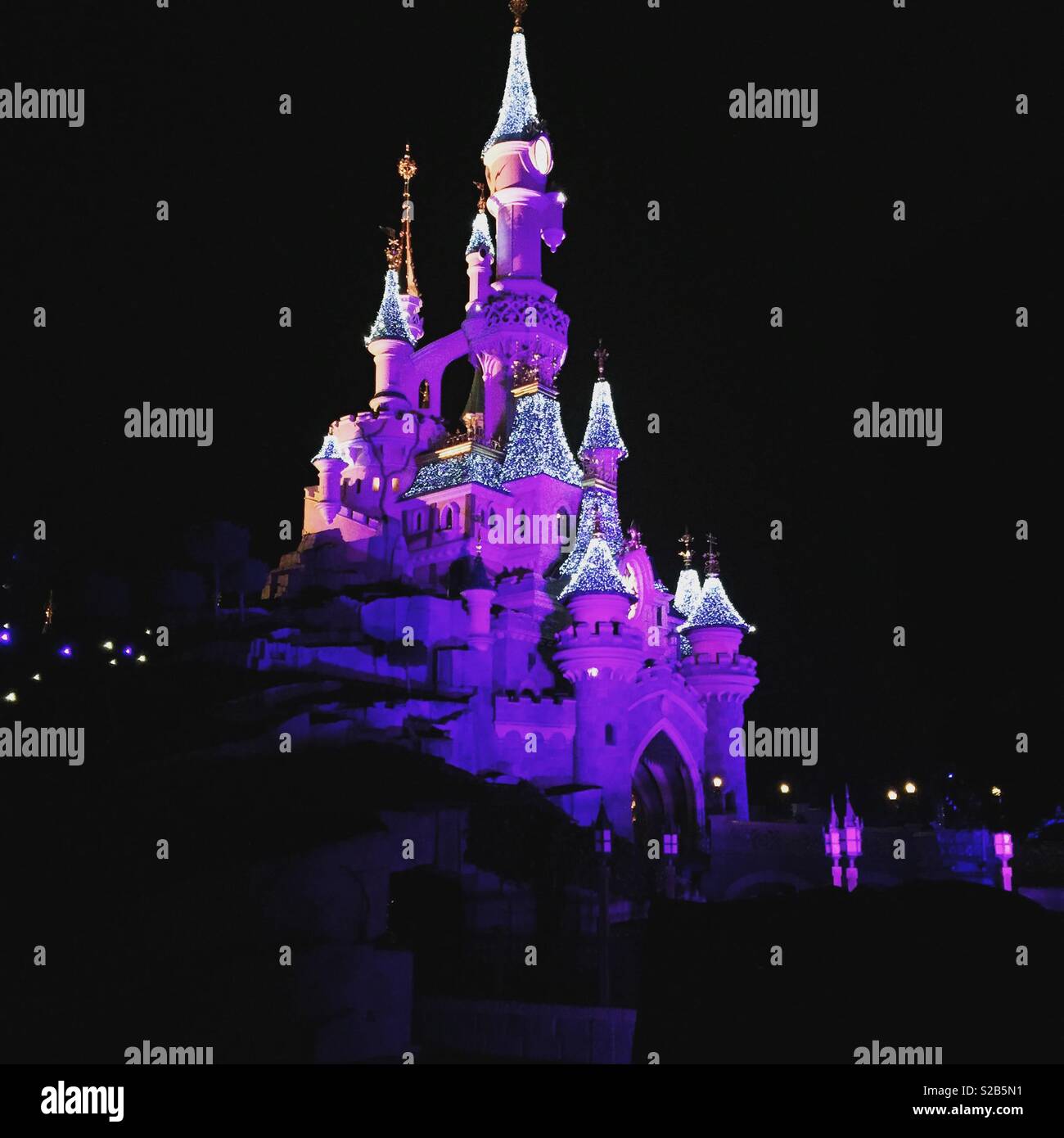 Disneyland Paris at night Stock Photo