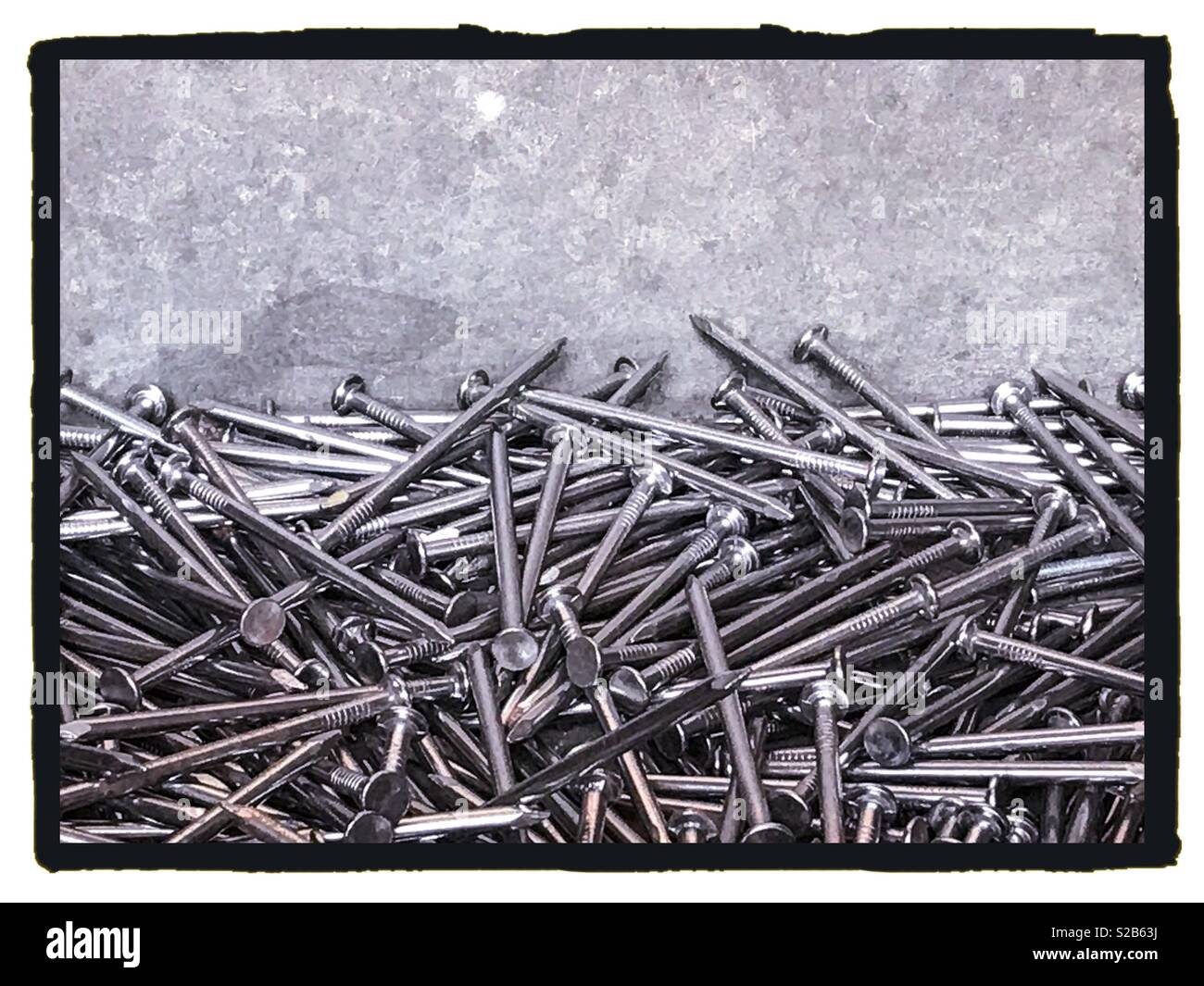 Close up view of nails with grey background - Smartphone Captured Stock Image