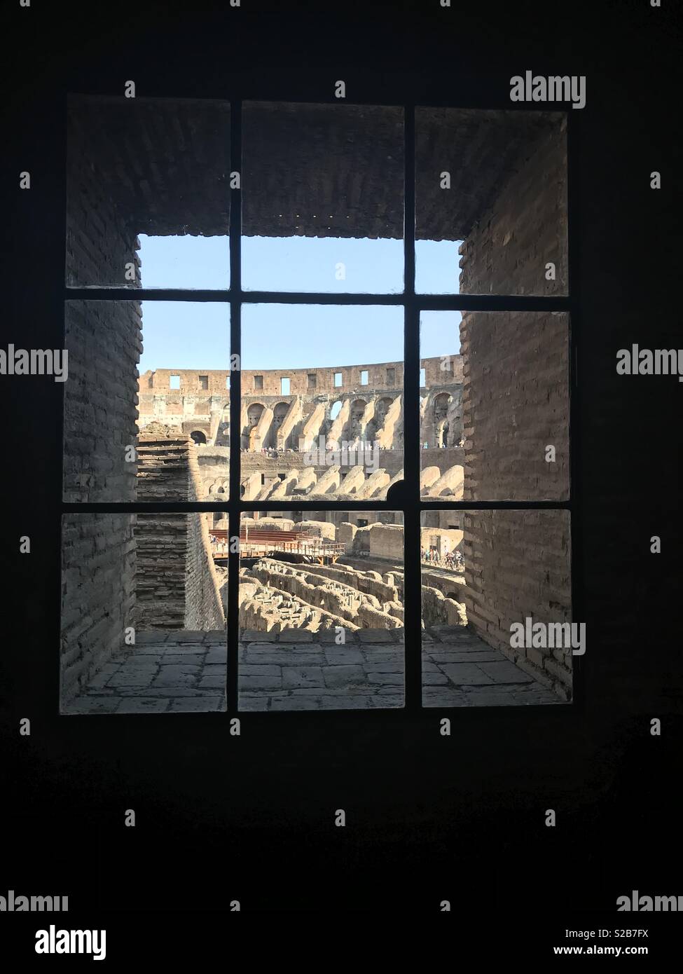 Looking through the window to the colloseum Stock Photo