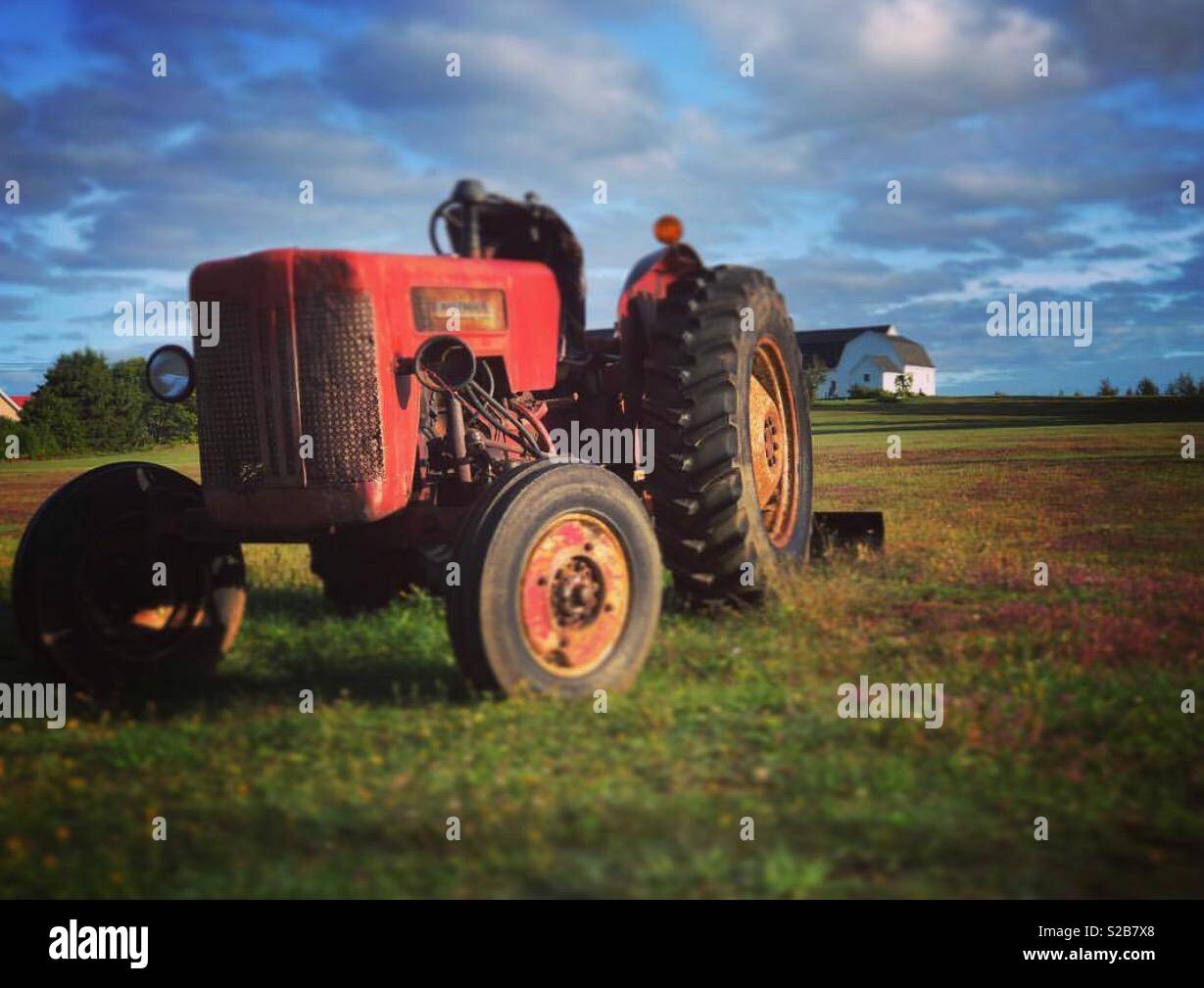 Old tractor on farm in west Covehead, Prince Edward Island, Canada