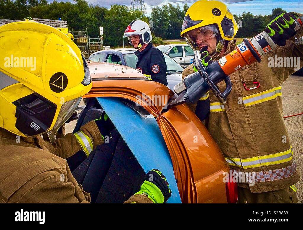 Firemen Cutting Car - Smartphone Captured Stock Image
