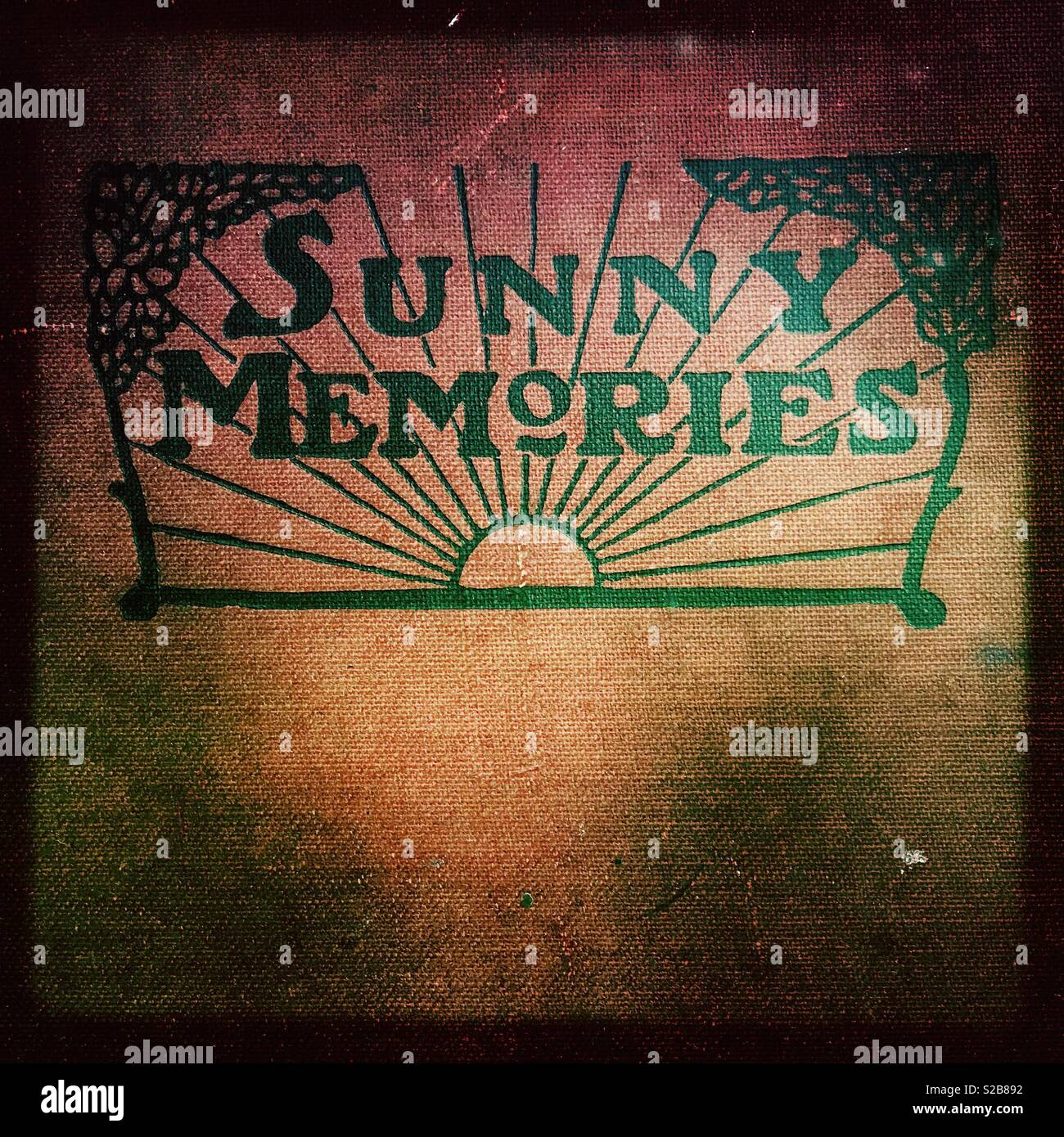 Old photograph album with the title Sunny Memories. Stock Photo
