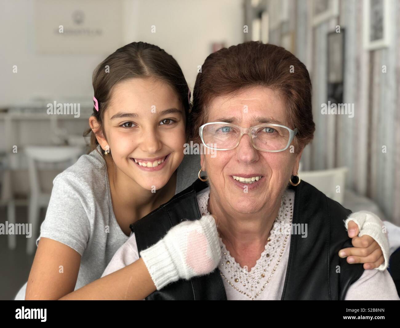 Grandmother and her granddaughter - Smartphone Captured Stock Image
