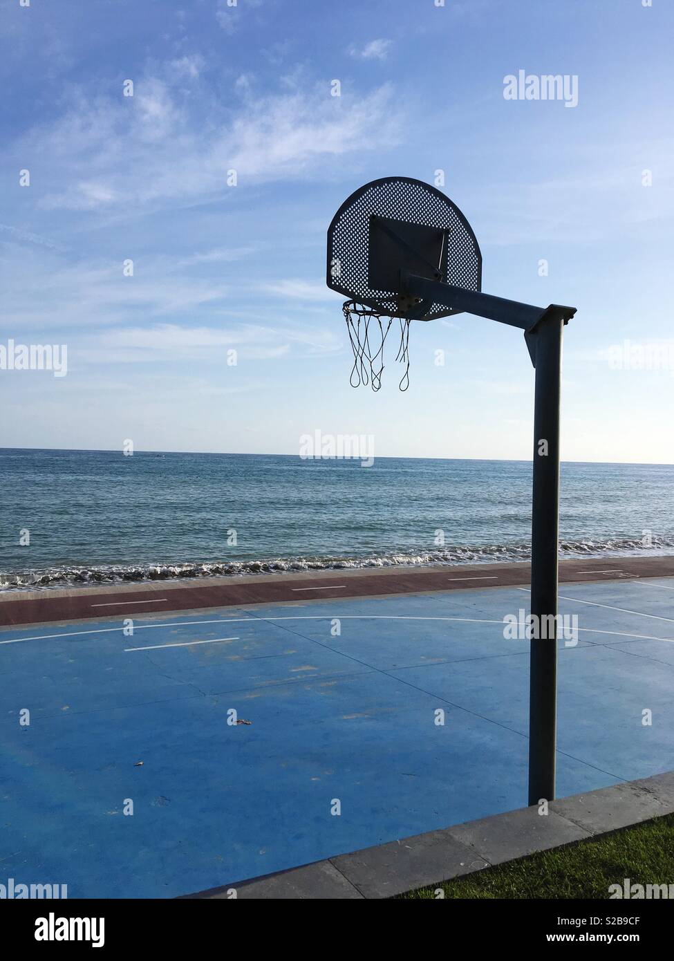 Outdoor Basketball Court Next to the Mediterranean Sea, Cambrils, Catalonia, Spain Stock Photo