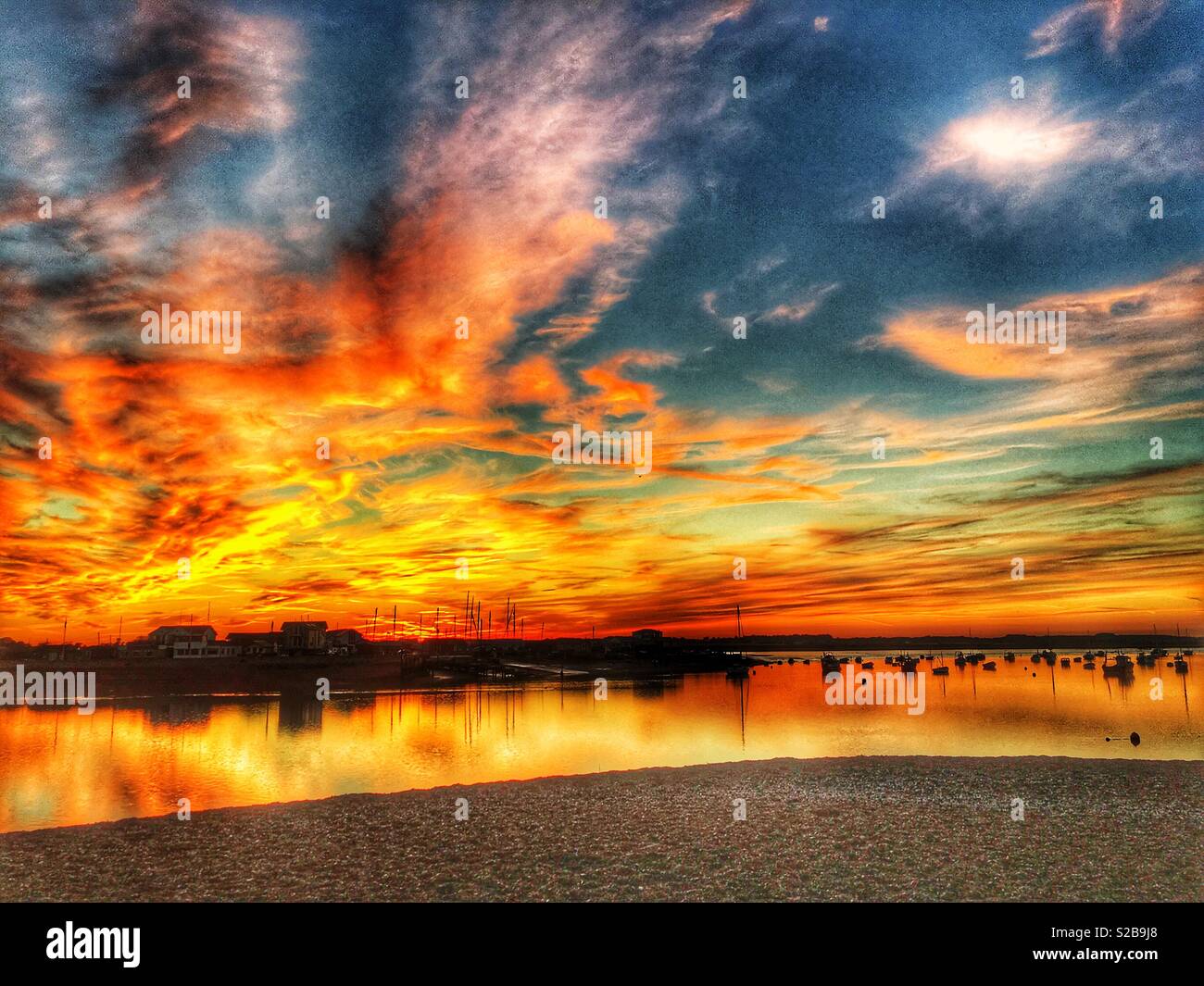 Sunset over the river Deben, Felixstowe Ferry, Suffolk, England. - Smartphone Captured Stock Image