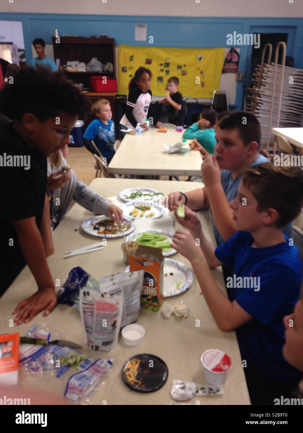 Kids making healthy snacks Stock Photo