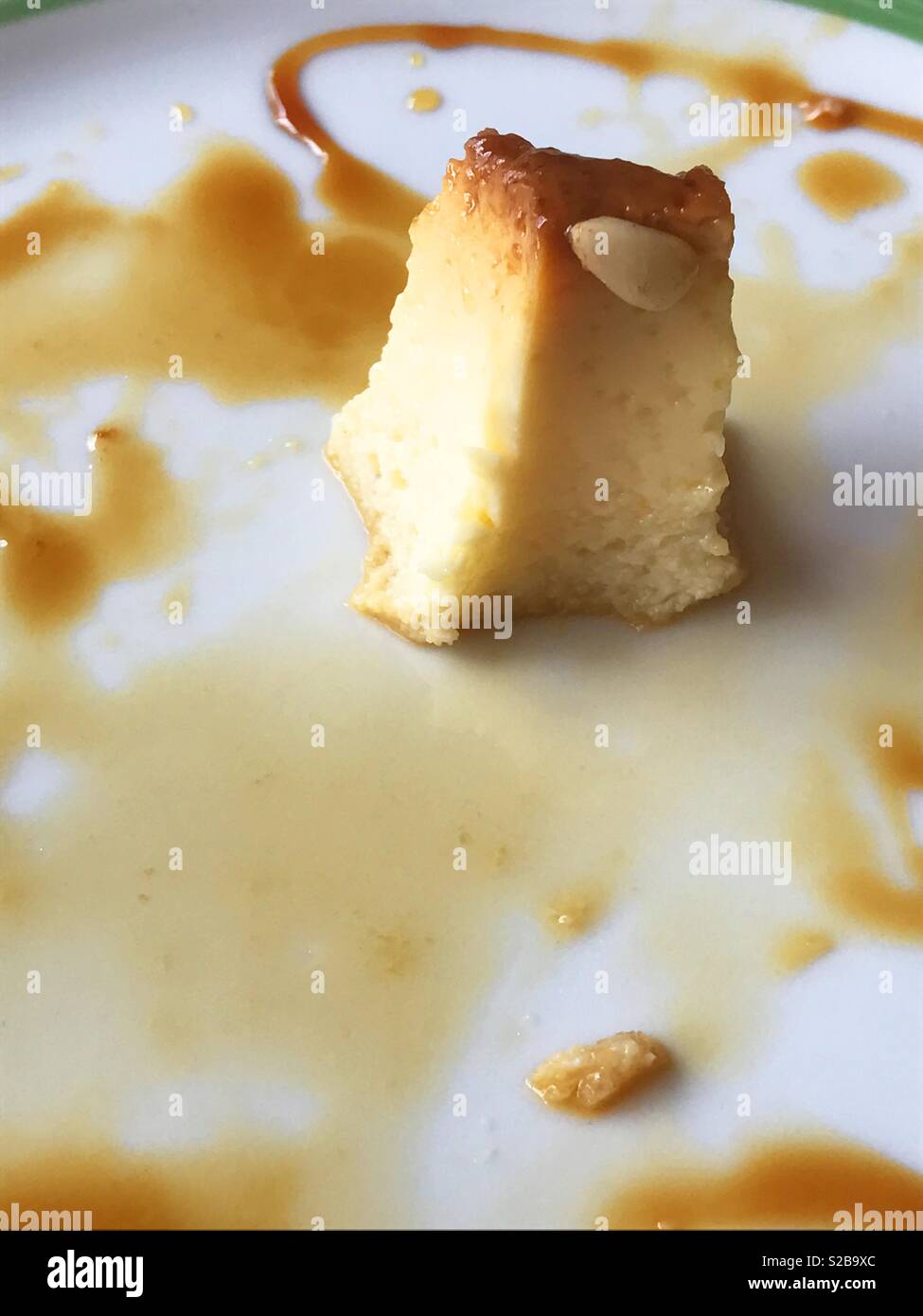 Leftovers of creme caramel. - Smartphone Captured Stock Image