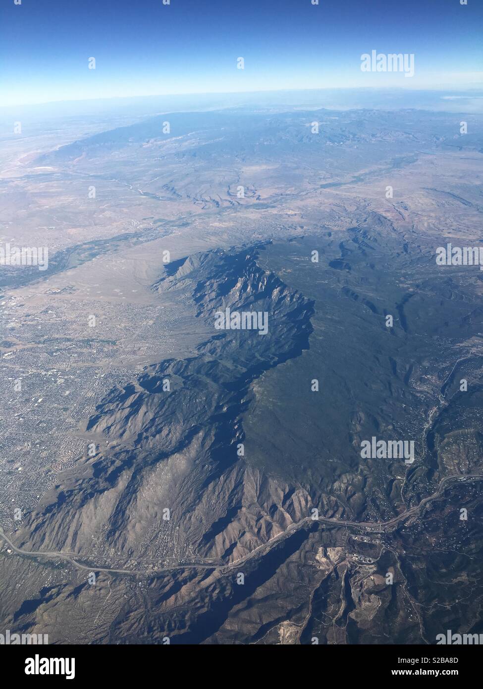 Aerial view of the Sandia Mountains with Interstate 40 at Taejon Pass, New Mexico, USA Stock