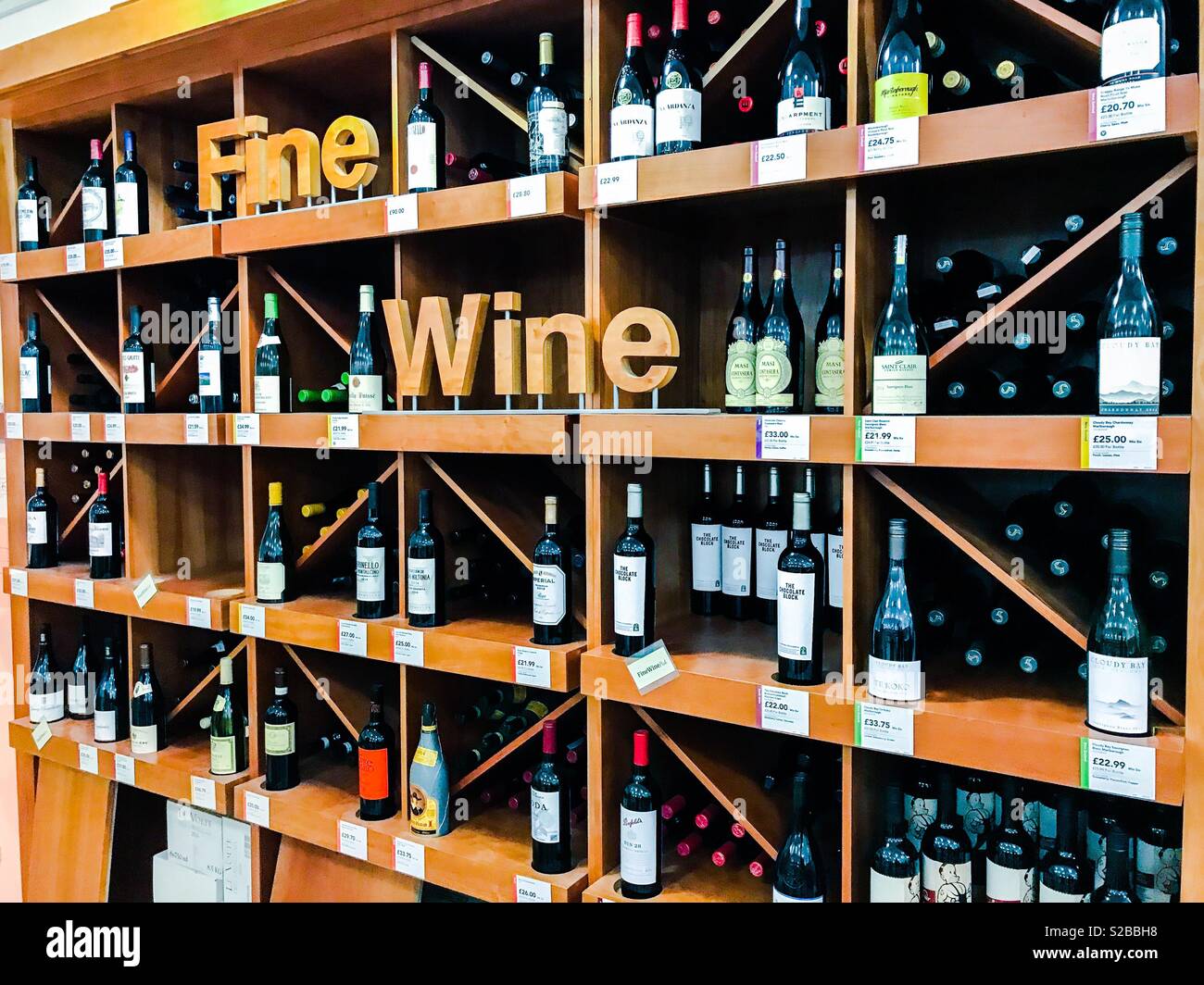 Fine wine shelves with good quality fine wines Stock Photo
