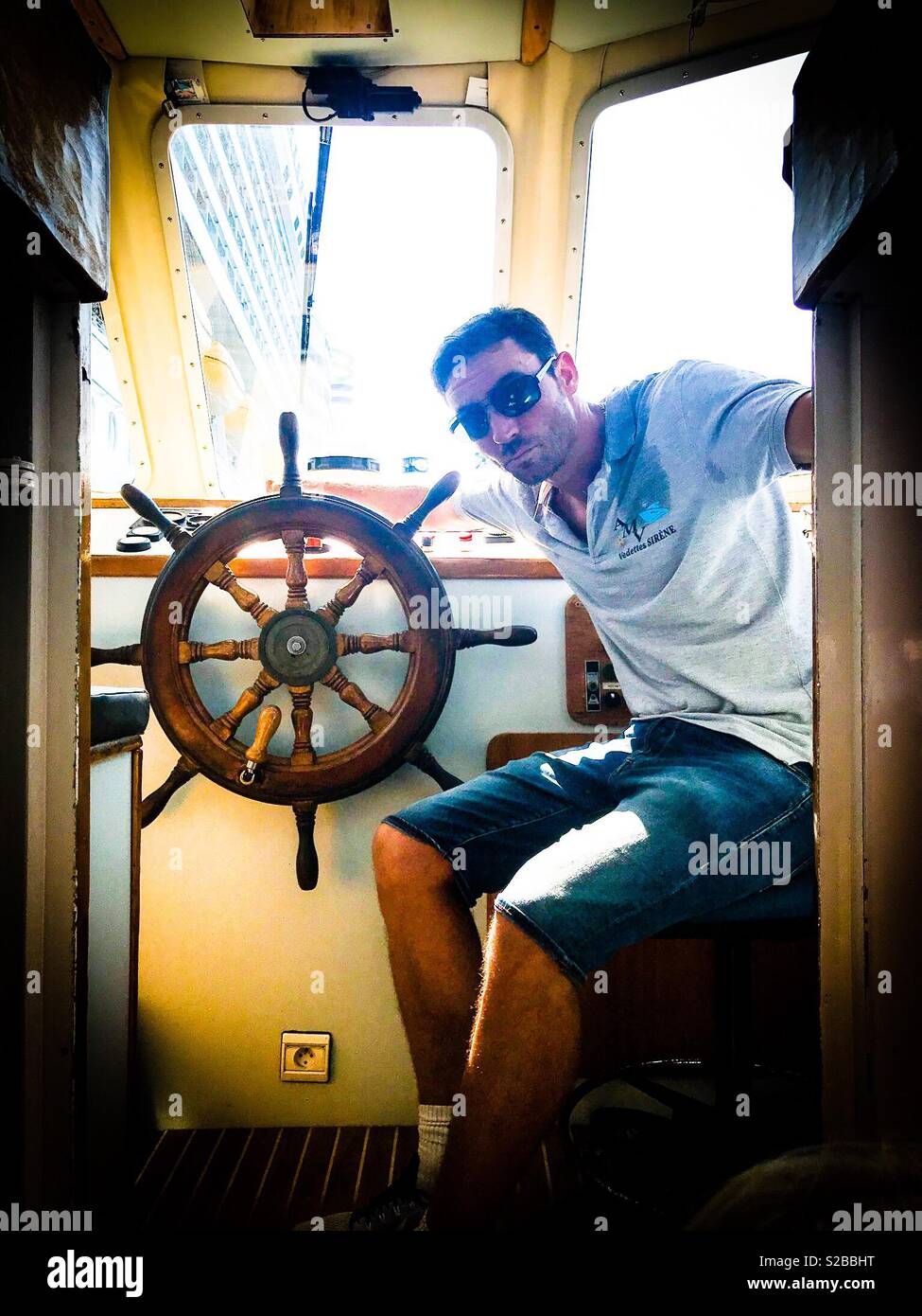 Captain of a boat Looking on - Smartphone Captured Stock Image