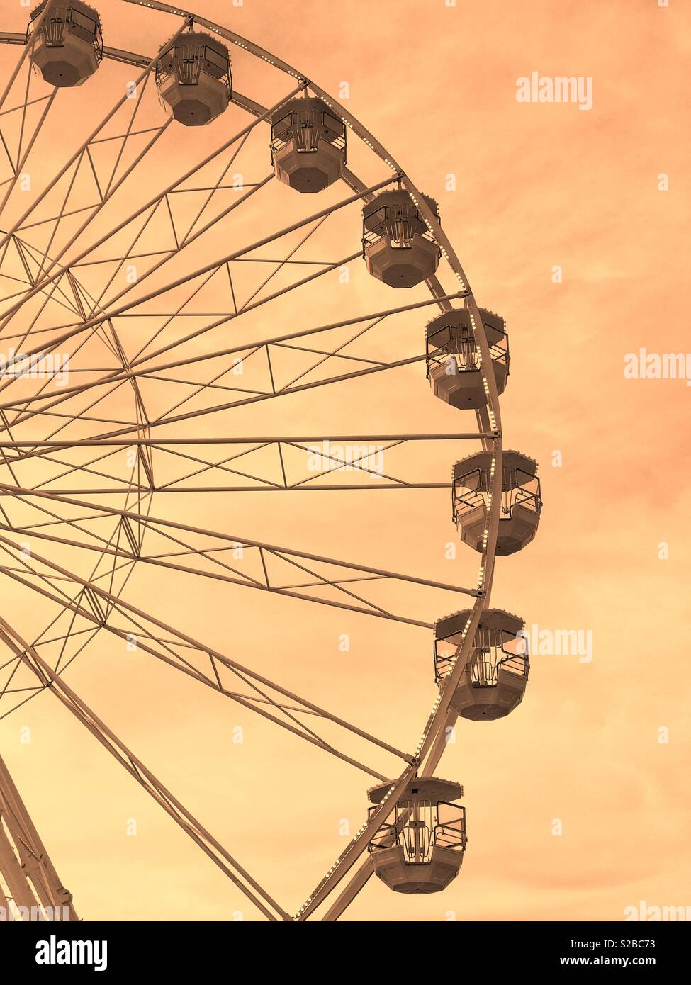 A section of a Ferris Wheel. Entertainment for both children and adults - even if you just go round in circles! Photo Credit - © COLIN HOSKINS. - Smartphone Captured Stock Image