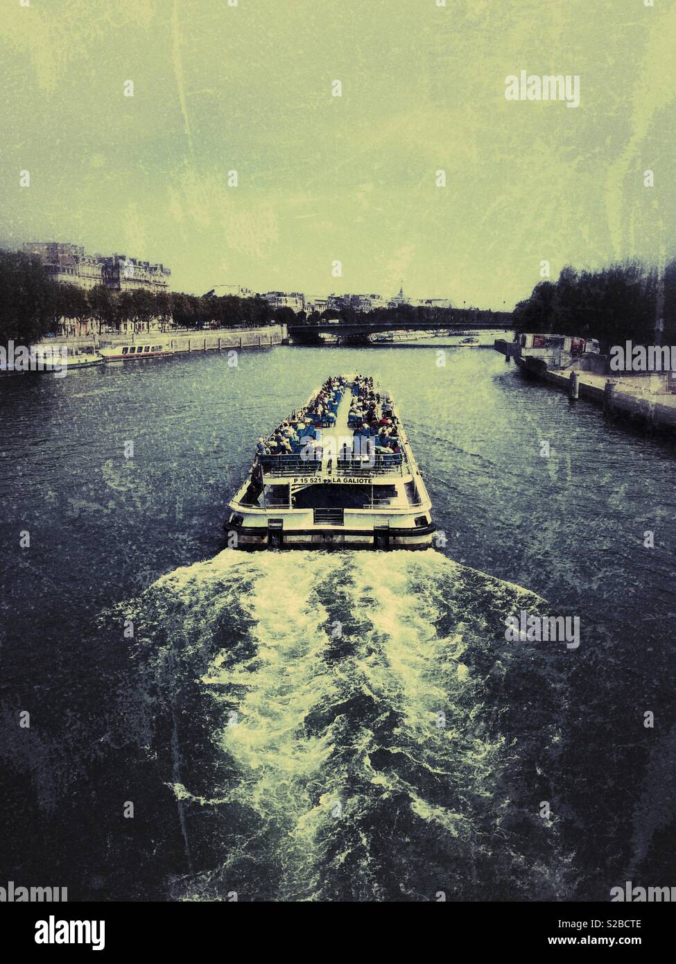 People on cruise boat in Seine river Paris France - Smartphone Captured Stock Image