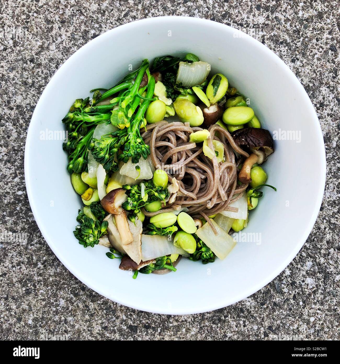 Yummy healthy vegan soba noodle bowl with greens Stock Photo