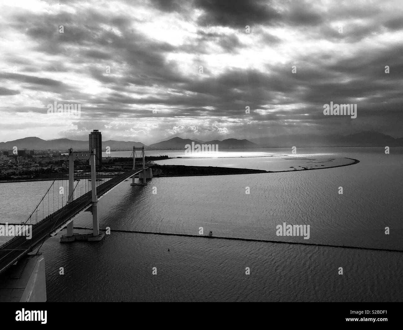 A bridge at the entrance to the river in Danang, Vietnam. - Smartphone Captured Stock Image