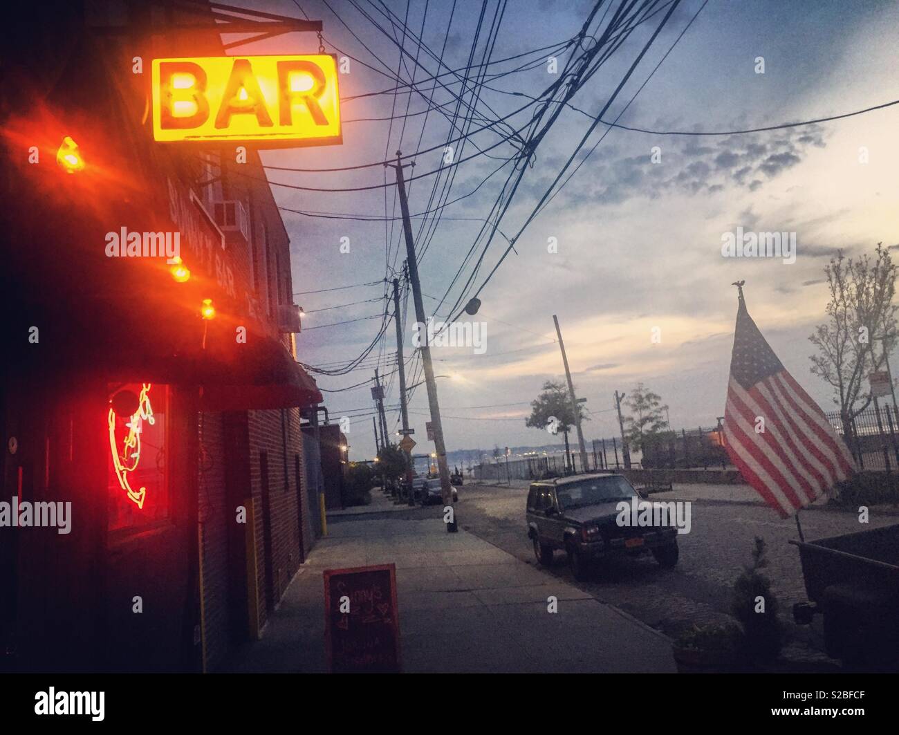 The exterior of Sunny’s Bar in Red Hook Brooklyn at dusk. Stock Photo