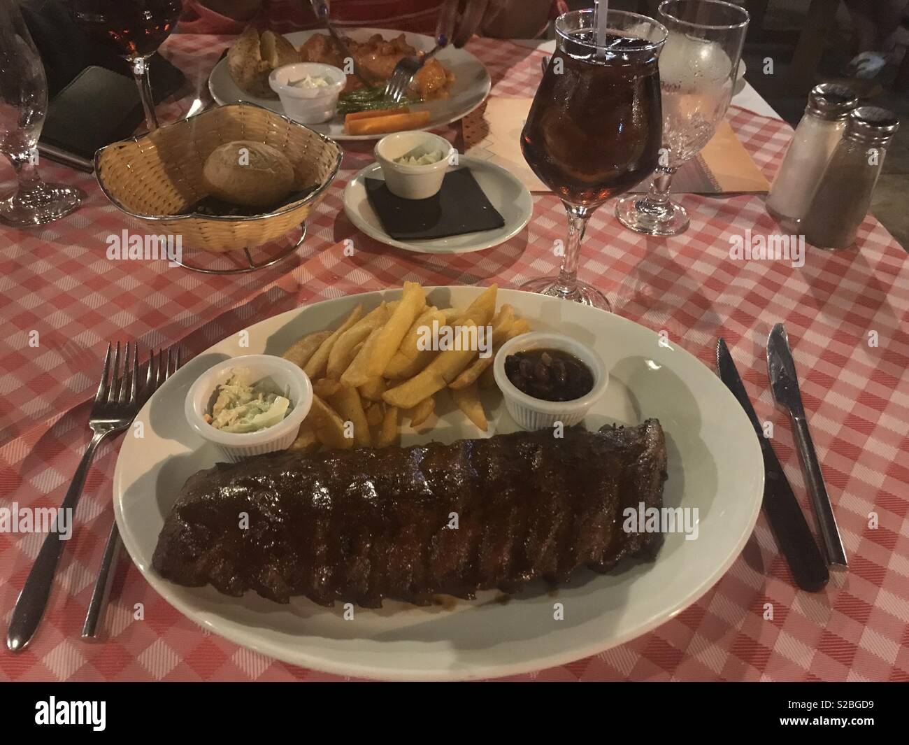 Jack daniels ribs & Long Island ice tea Stock Photo Alamy