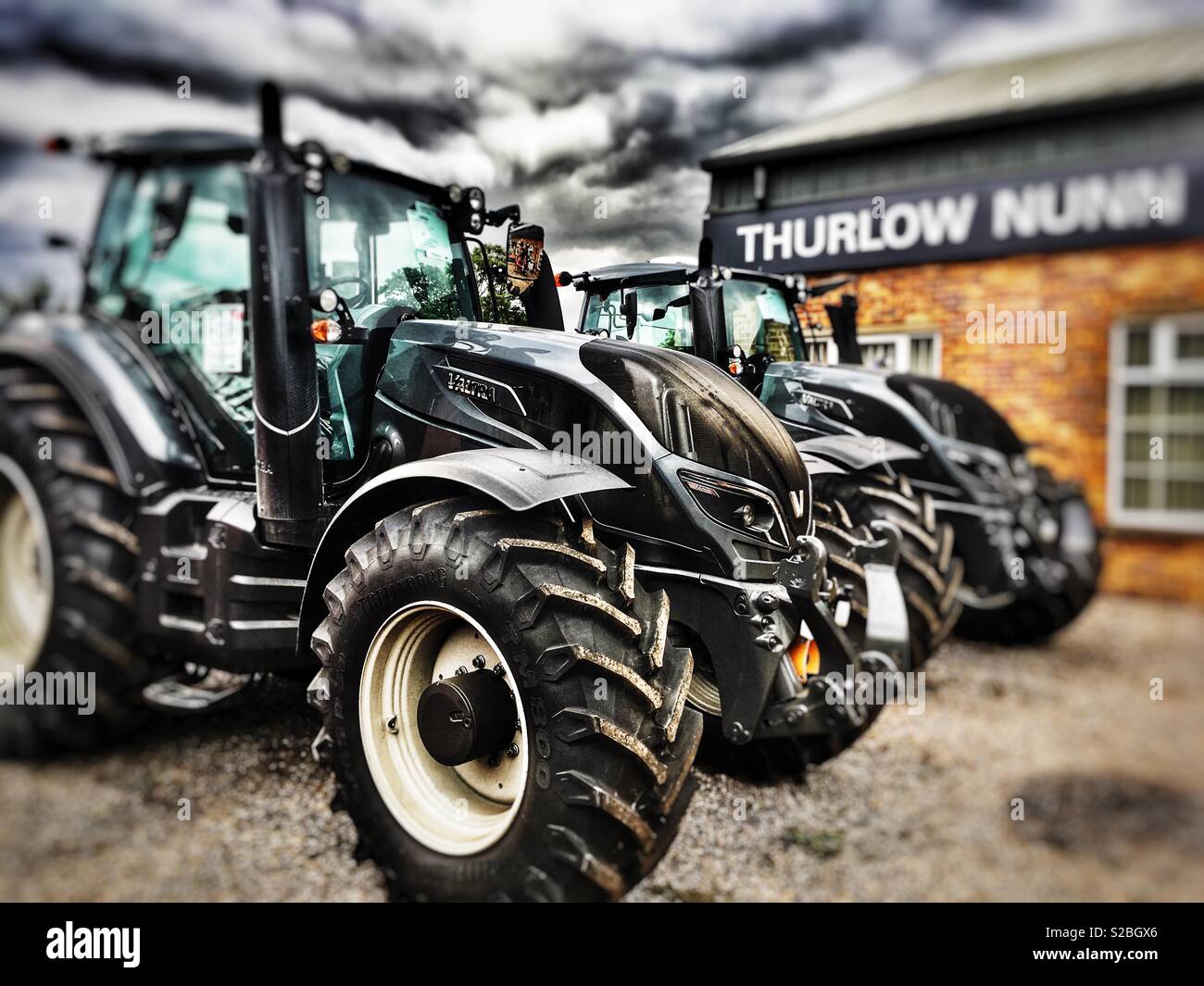 Valtra tractors at dealership, Melton, Suffolk, England Stock Photo Alamy