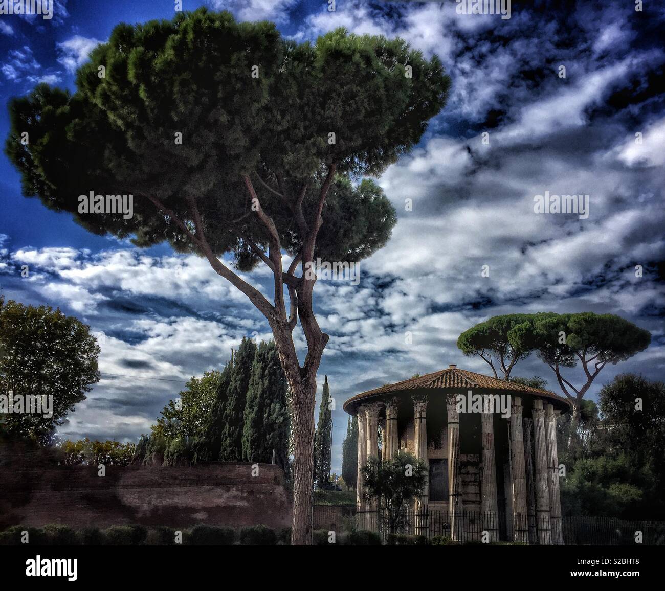 The Temple of Hercules, a Roman temple in the Piazza Bocca della Verità (mouth of truth) in Rome, Italy - Smartphone Captured Stock Image