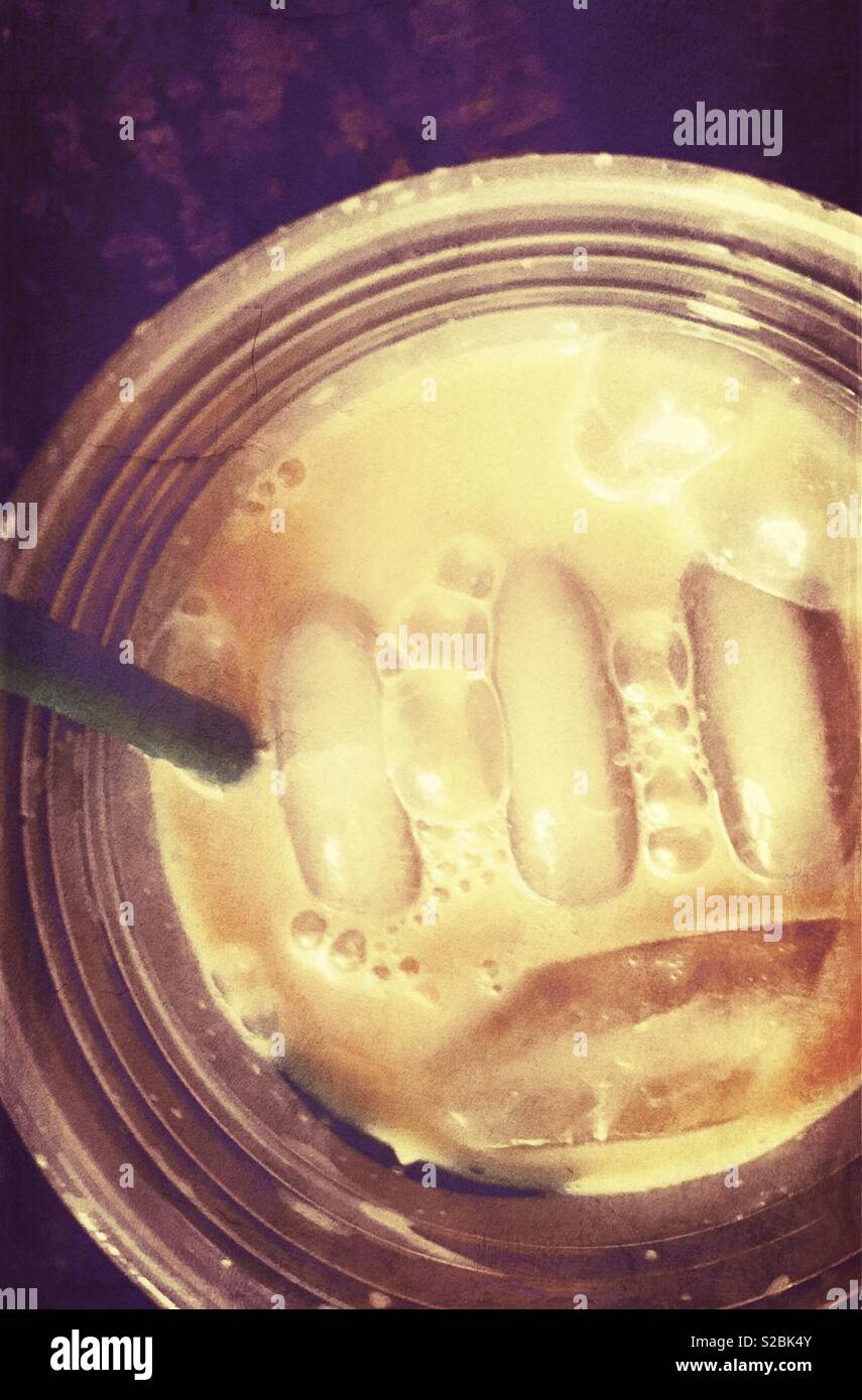 A caramel frappe at Chino iced drink with extra caramel drizzle from a café in the USA Stock