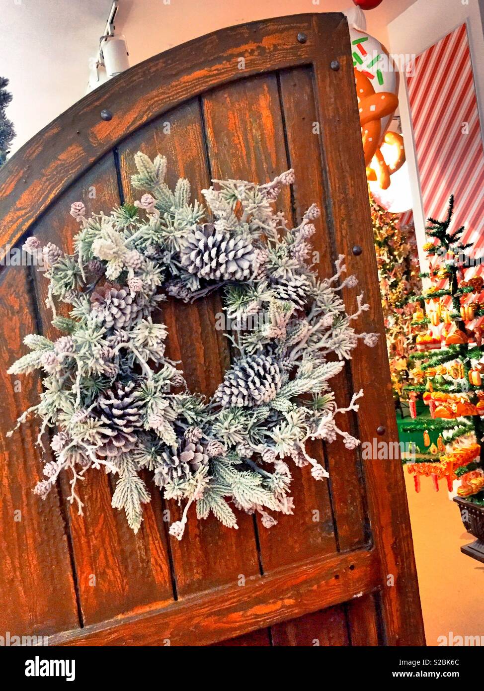 Macy’s holiday Lane feachers many festive Christmas wreaths, NYC, USA - Smartphone Captured Stock Image