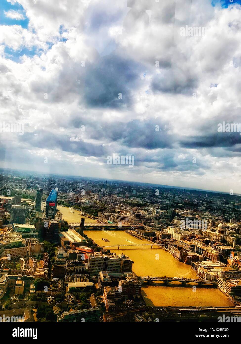 View of London and the river Thames on a hot summer afternoon - Smartphone Captured Stock Image
