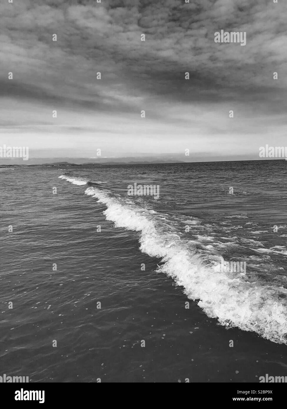 White ocean waves Black and White Stock Photos & Images - Alamy