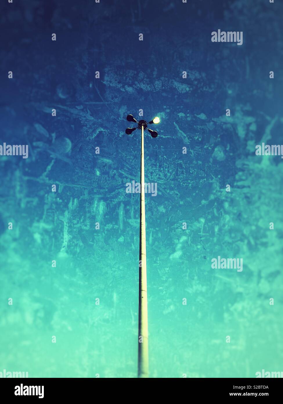 Light pole with grunge effect. - Smartphone Captured Stock Image