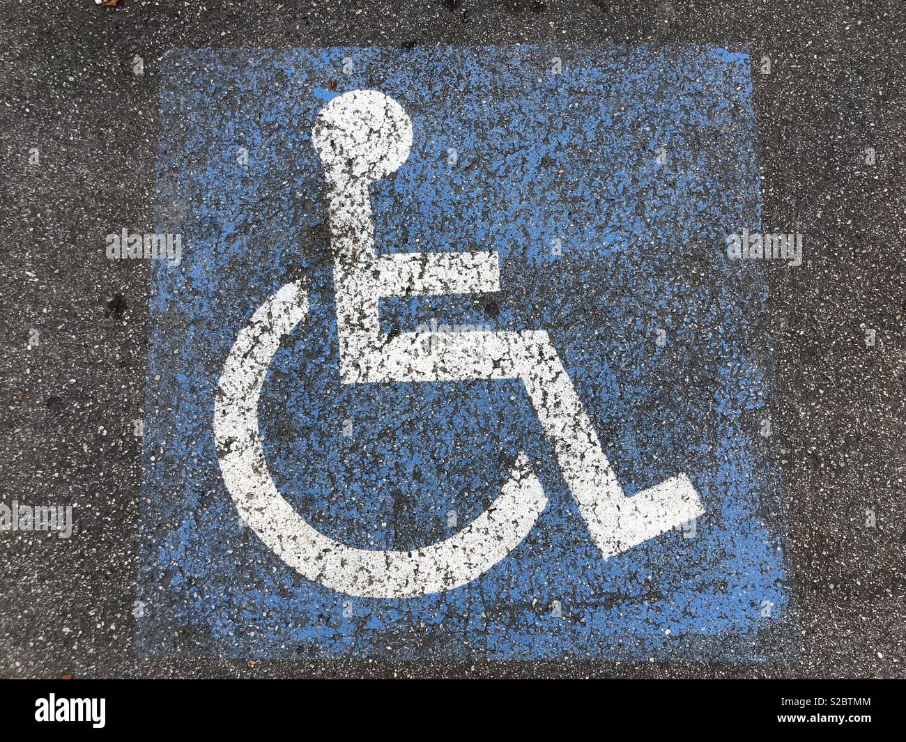 Disabled handicap parking space reserved for handicapped Stock Photo