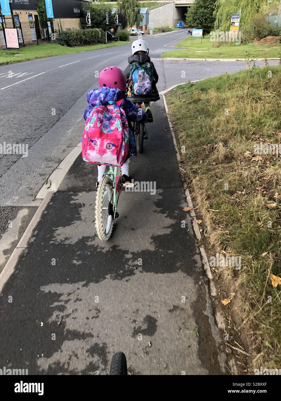 Biking to school Stock Photo