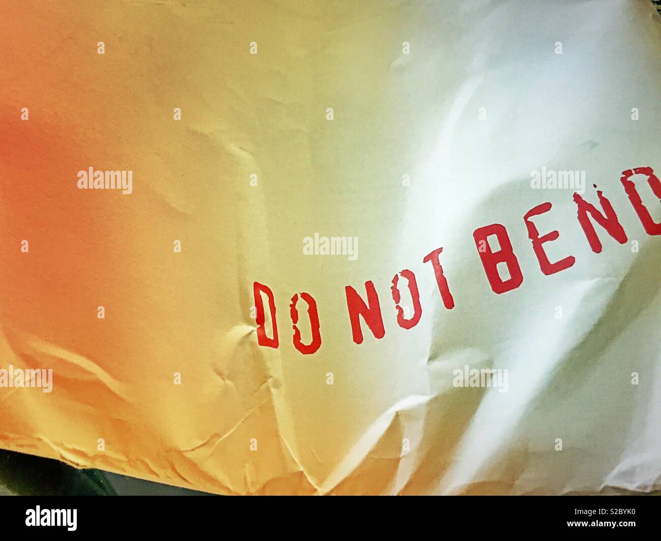 Crumpled large envelope stamped “do not bend“, USA Stock Photo