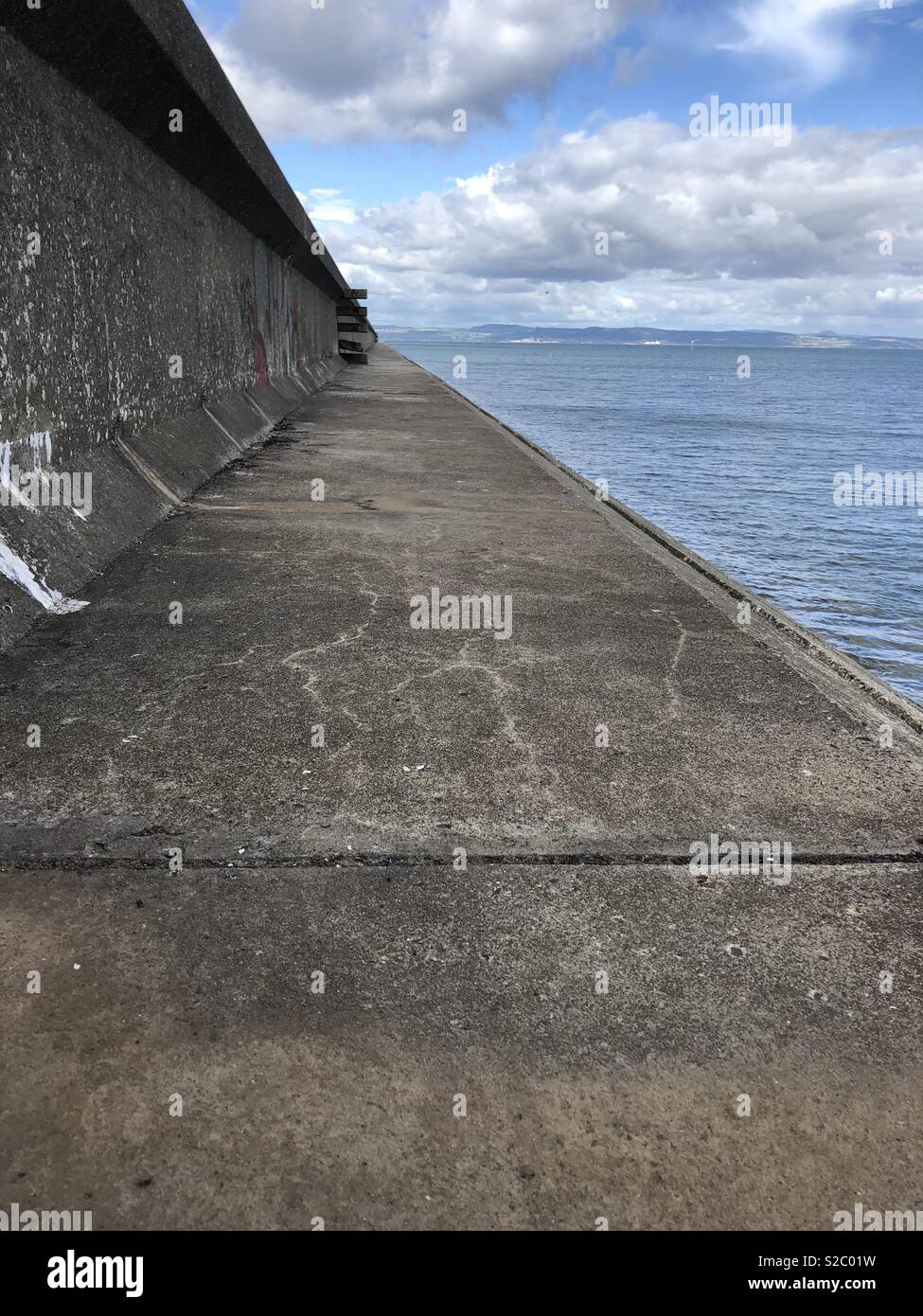Sea wall in Leith Edinburgh Stock Photo