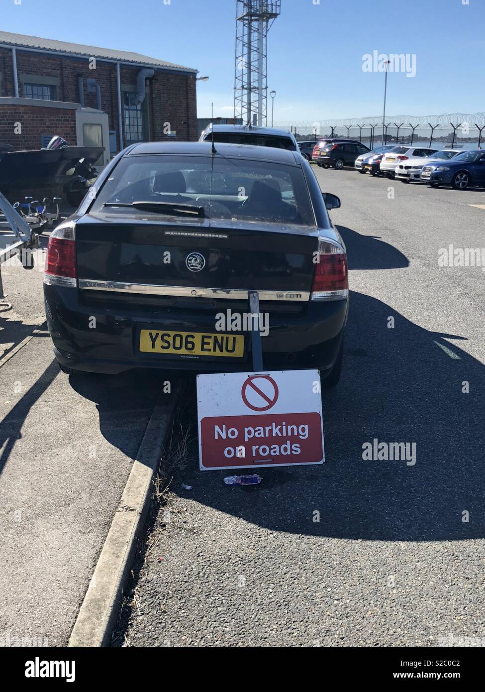 Sign ignoring bad parking Stock Photo