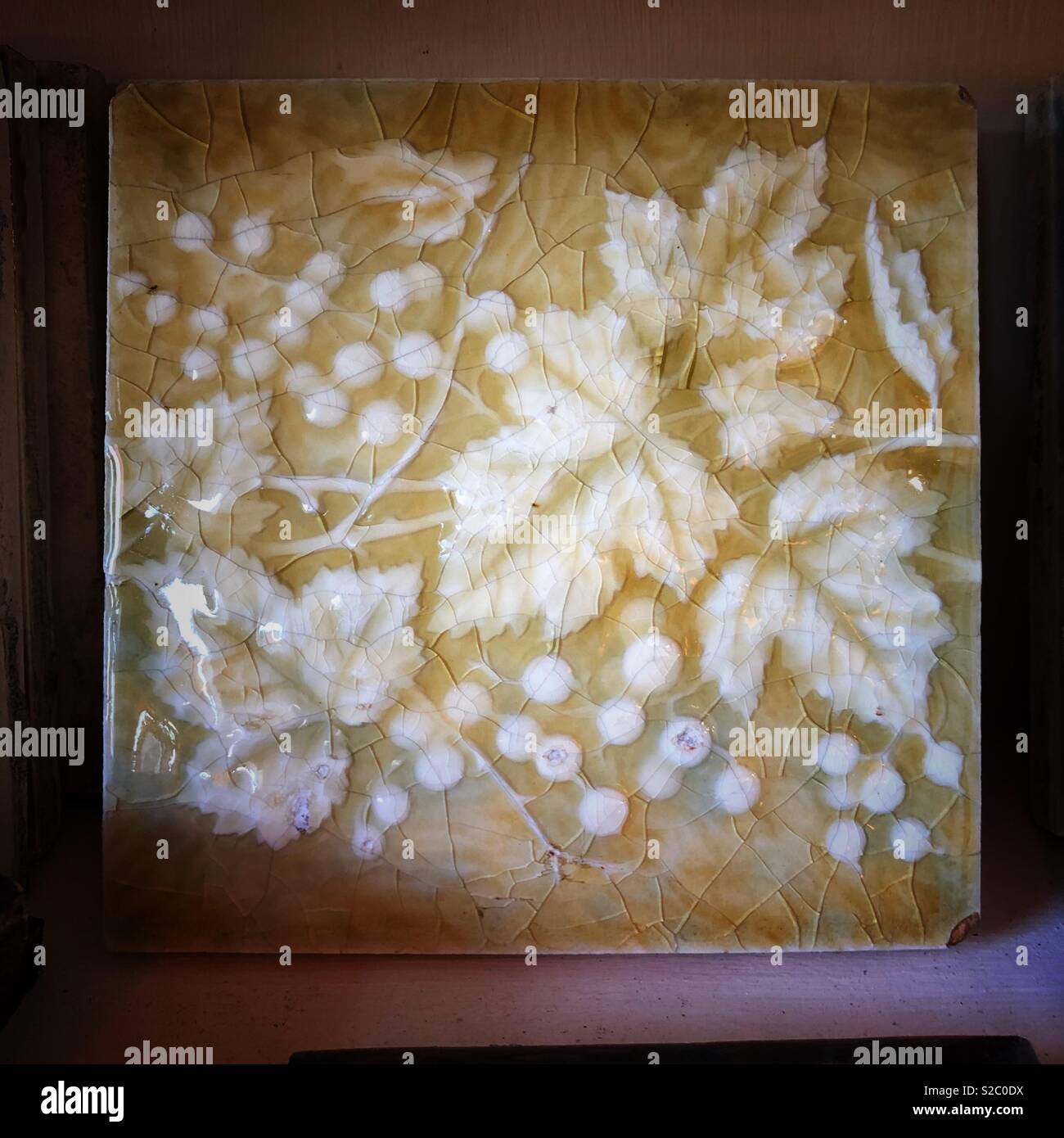 Ceramic tile found at Ohmega Salvage in Berkeley, California. - Smartphone Captured Stock Image
