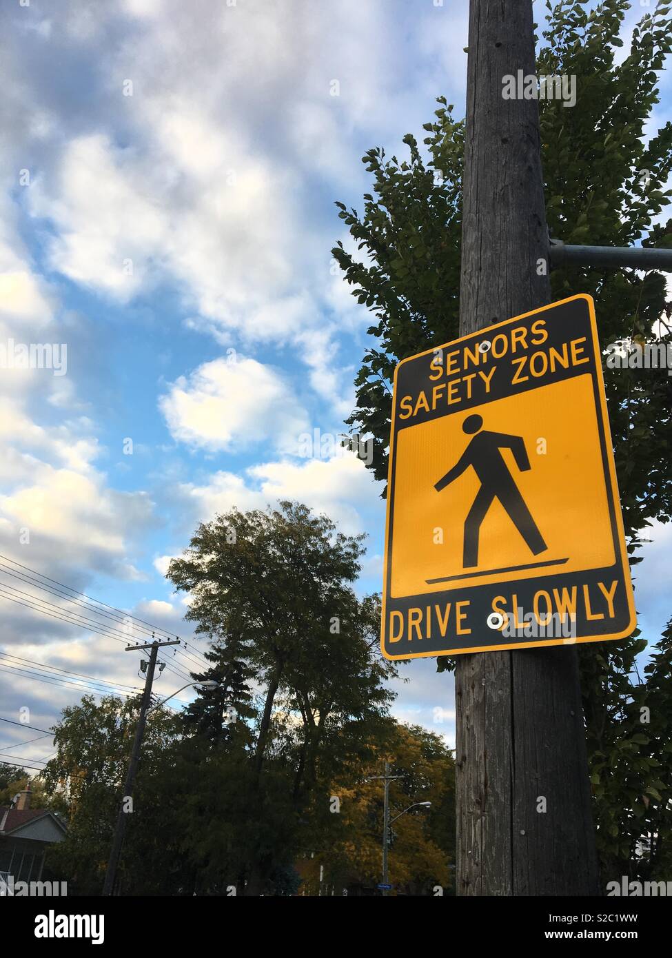 Road signage for drivers to slow down speed in Toronto - Smartphone Captured Stock Image