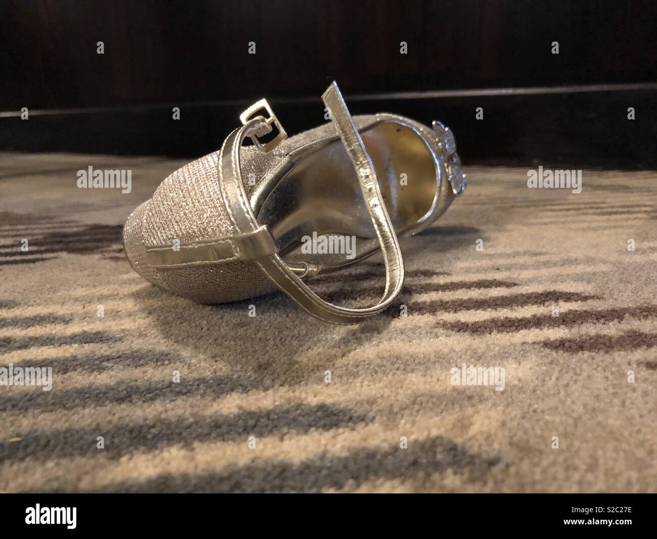 Abandoned shoe, lost at a wedding Stock Photo - Alamy