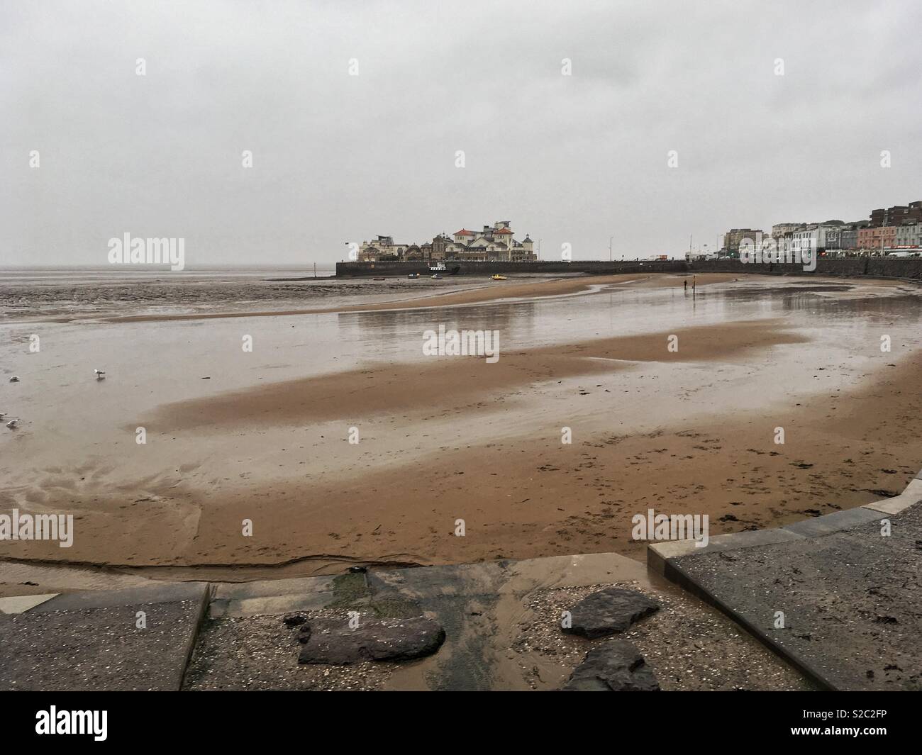 A wet, windy, and gloomy day in Weston-super-Mare, UK as the edge of Storm Callum passes over the town - Smartphone Captured Stock Image