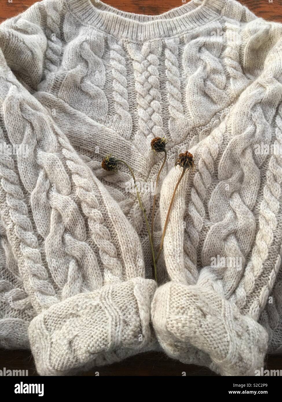 Cozy white sweater Stock Photo
