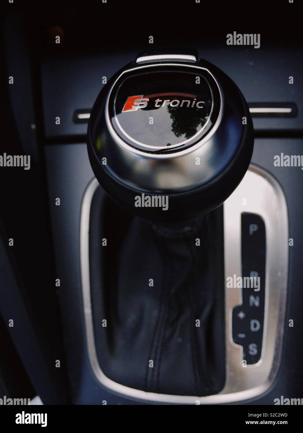 Gearstick of an automatic Audi car, shallow depth of field, focus on the knob - Smartphone Captured Stock Image