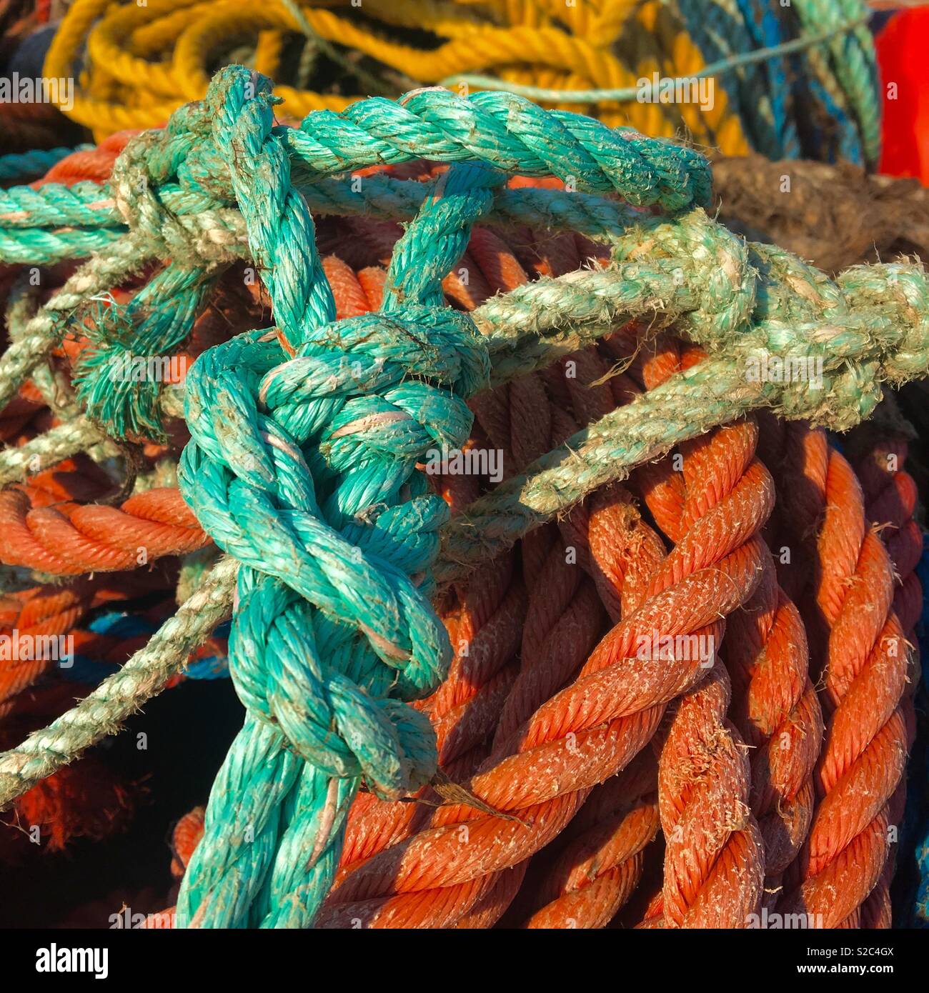 Fishing ropes piled up in a stack in Nova Scotia Canada - Smartphone Captured Stock Image