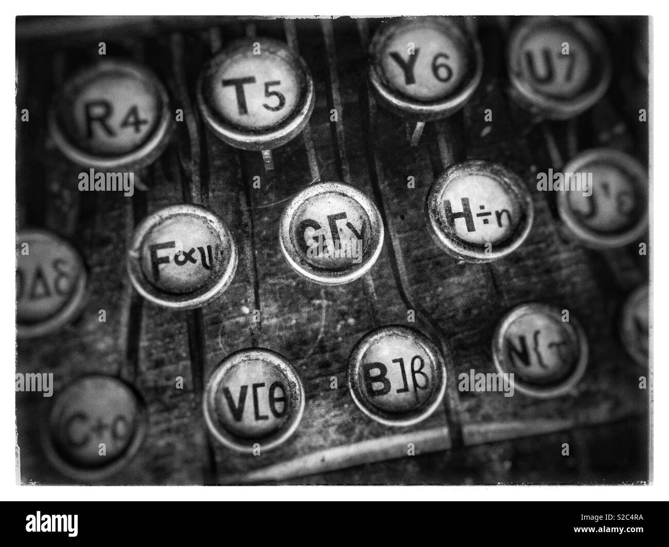 Vintage folding typewriter keys with distressed grungy look Stock Photo