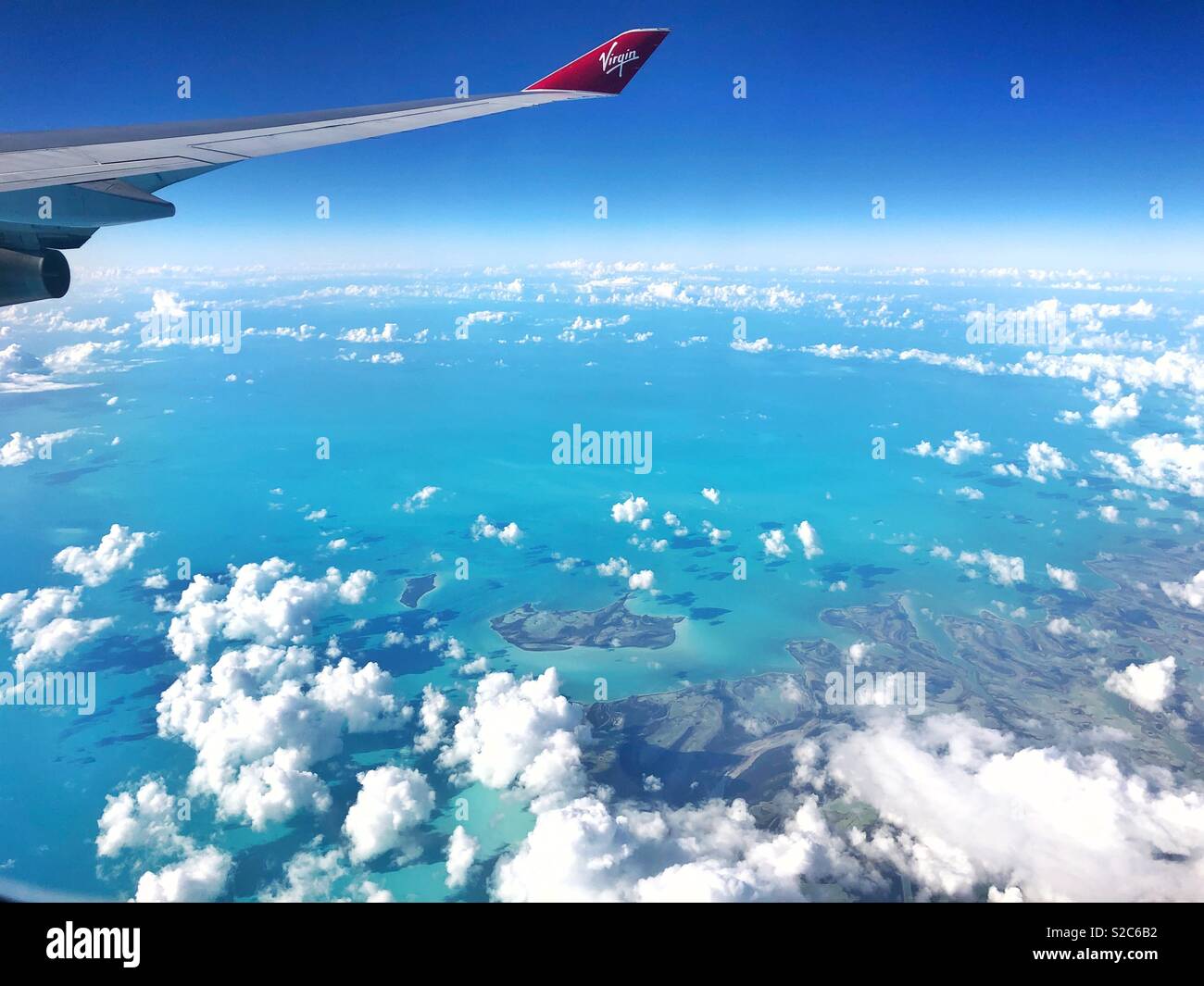 Virgin Atlantic Boeing 747 aircraft wingtip over the Bahamas Stock Photo
