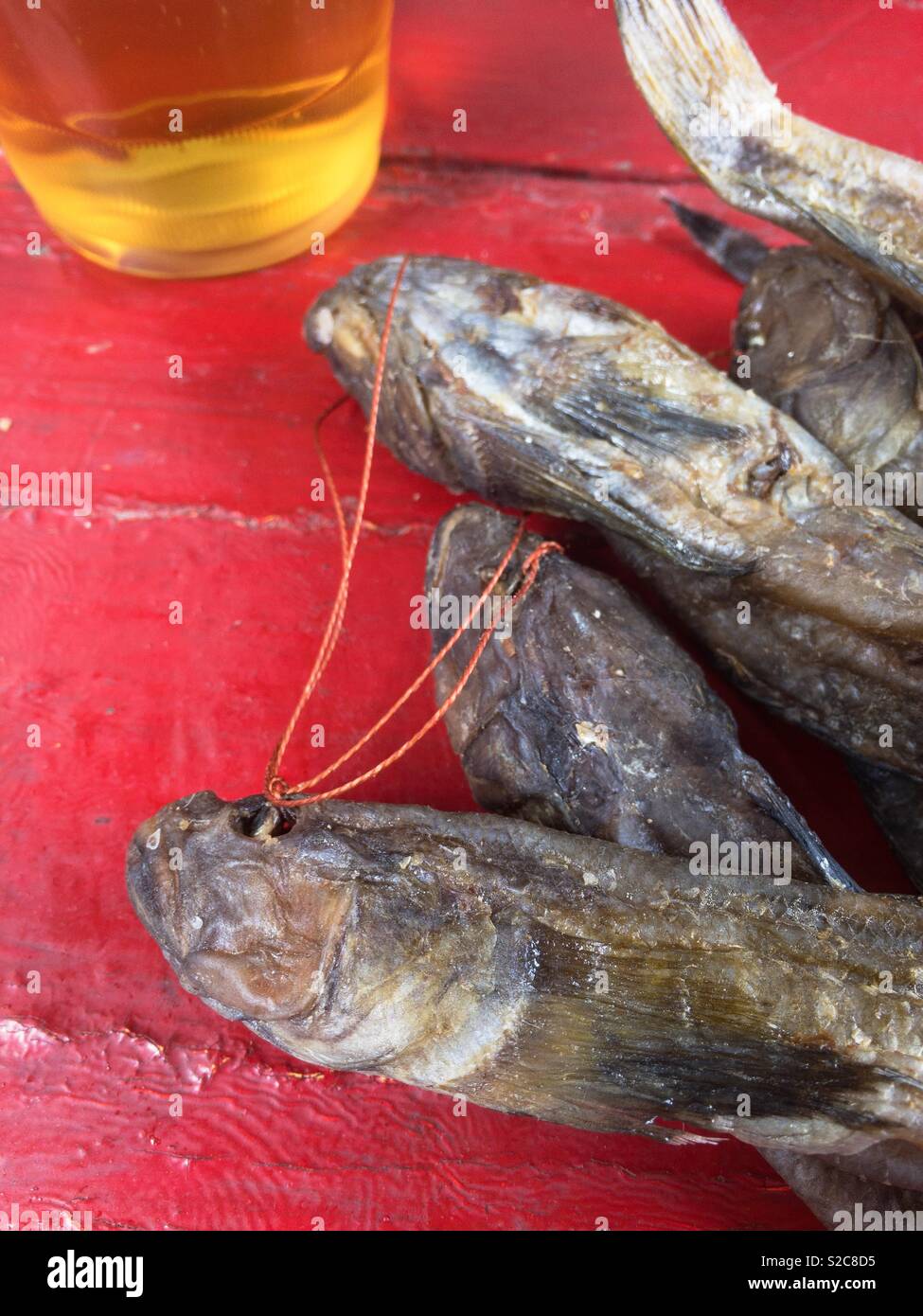 Dry fish and beer, local food Ukraine - Smartphone Captured Stock Image
