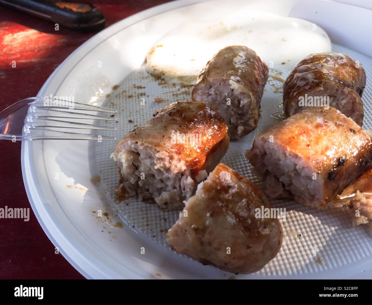 Grilled sausages in a disposable plate, Ukraine Stock Photo